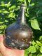 Transitional Mallet English Colonial Black Glass Wine Bottle From 1710-1720