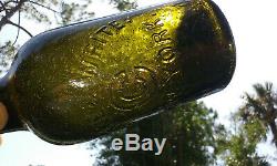 Tumbled 1860's Antique Black Glass Clarke & White, Saratoga Water Bottle
