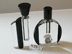 Two Art Deco large black and white glass perfume bottles from prominent estate