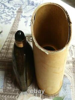 Vintage Art Deco Lentheric Miracle perfume bottle. Black glass, gold dust