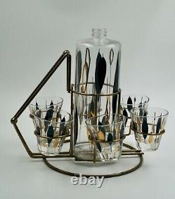 Vintage Mid Century Modern Drink Set withStand 6 Glasses & A Bottle Black & Gold
