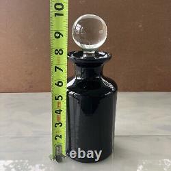 Vintage black glass perfume bottles