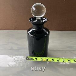 Vintage black glass perfume bottles