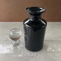 Vintage black glass perfume bottles